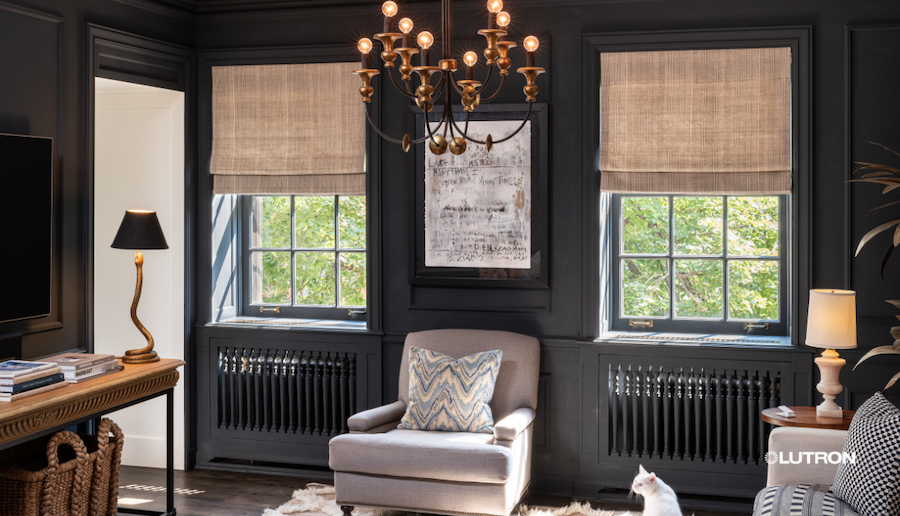 Lutron Roman shades half-lowered over windows in a living room.
Source: Savant.